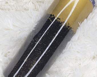 Gold and black splatter design with glitter on 20 oz tumbler with epoxy finish
