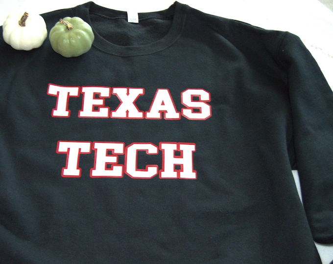 Black TX Tech sweatshirt with red and black and white letterin