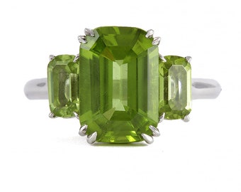 3.95cts Peridot ring, large statement cocktail ring. Platinum. The weight of the center stone is 3.95cts, upcycled from a vintage stick pin.