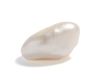 5.4ct all natural freshwater river pearl. 13x9.5mm. All natural white, silver, gold color river pearl. AKA Mississippi pearl. NOT cultured.