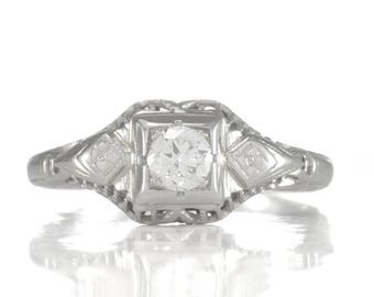 0.20ct vintage diamond engagement ring. J Si1 Natural round old European cut diamond, 14kt white gold, Filigree. Art Deco 1930s. Estate.