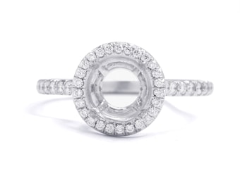 Halo diamond engagement ring setting/semi mounting. Fits 7mm round. 18kt white gold, diamonds, prongs. Setting only.