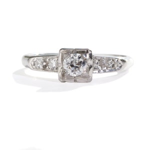 0.20ct vintage diamond engagement ring. J Si1 Natural round old European cut diamond, 14kt white gold. Circa 1940. Estate. Size 4.75.