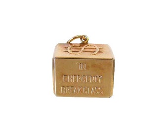 14K Gold Dollar Charm In Emergency Break Glass