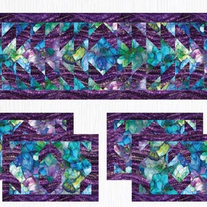 May include: A set of four purple and blue patterned table runners with a geometric design. The runners are made of fabric and have a wavy border.