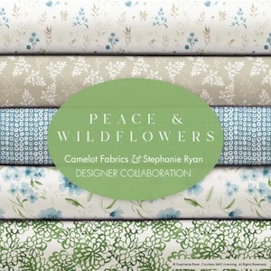 May include: A stack of fabric featuring different patterns with a green oval label that reads "Peace & Wildflowers" and "Camelot Fabrics & Stephanie Ryan Designer Collaboration".