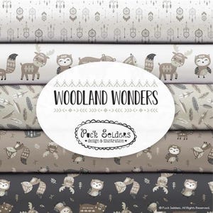 May include: Fabric rolls featuring woodland designs with dream catchers, deer, owls, and feathers in neutral colours. The text "WOODLAND WONDERS" and "Puck Selders" are displayed on the image.