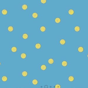 May include: A pattern of yellow tennis balls with white lines on a light blue background. The tennis balls are scattered across the surface, creating a playful and sporty design. The balls are evenly spaced.