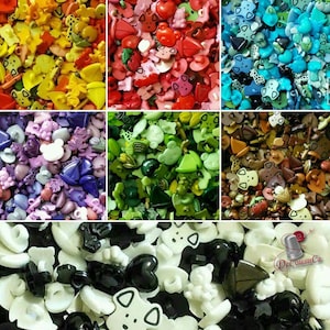 May include: Assortment of colourful plastic buttons in various shapes, including hearts, animals, and geometric designs. The buttons are arranged in a grid pattern, with each section showcasing a different colour.