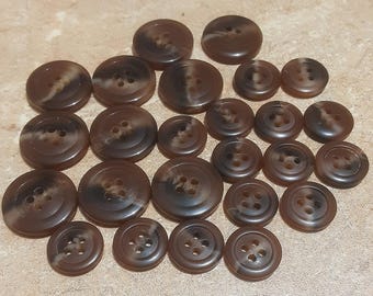 25 buttons, 15 x 15 mm and 10 x 21mm, Shade BROWN BEIGE, button 4 holes