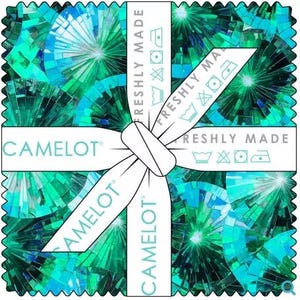 May include: A square stack of fabric squares featuring a vibrant teal and emerald green geometric pattern resembling faceted gemstones. The stack is secured with a white ribbon printed with the text CAMELOT and FRESHLY MADE with care icons.