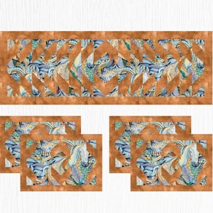 May include: A set of table linens with a geometric pattern in shades of blue, brown, and white. The linens feature a repeating pattern of triangles and diamonds.