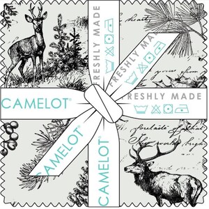 May include: A stack of fabric squares tied with a white ribbon featuring the text CAMELOT and FRESHLY MADE. The fabric has a light gray background with black ink illustrations of deer, pine branches, berries, and cursive script handwriting.
