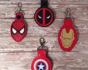 Superhero key fob, zipper pull, luggage tag, key chain, and backpack charm