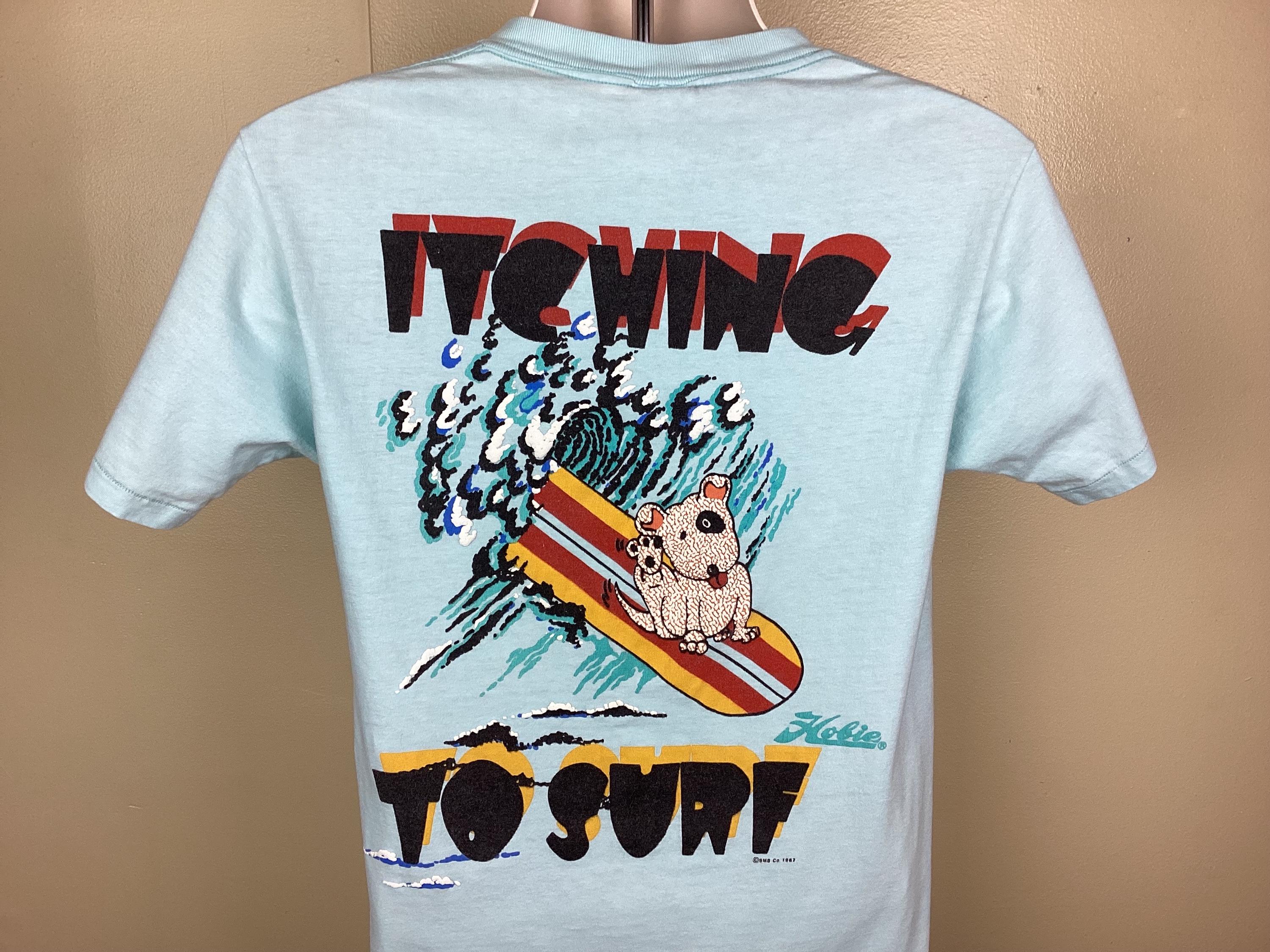 ヴィンテージ 1987 Hobie Itching To Surf Tシャツ ライトブルー M/L