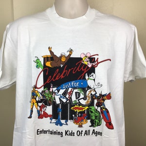 Koszulka Vtg 80s GI Joe Bravestarr Filmation Ghostbusters w kolorze białym L Celebrity Home Entertainment Video Cartoons Animation