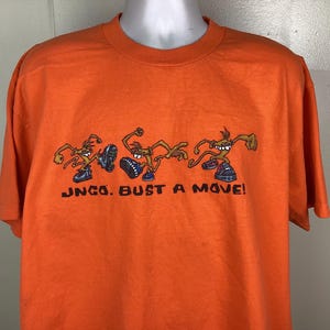 Maglietta vintage anni &#39;90 JNCO Bust A Move Monkeys, jeans larghi XL arancioni, marchio Made in USA