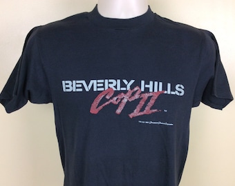 Camiseta Vtg 1987 Beverly Hills Cop II preta S/M anos 80 Eddie Murphy filme de comédia