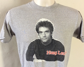 Camiseta Vtg 1984 Huey Lewis And The News cinza S/M anos 80 Pop Rock Band
