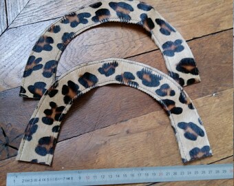 Shaped leopard handles