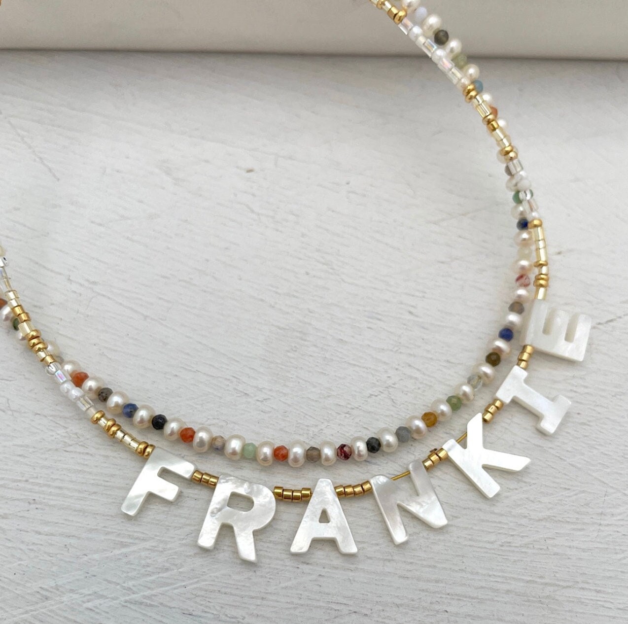 Mother of pearl name necklace deals