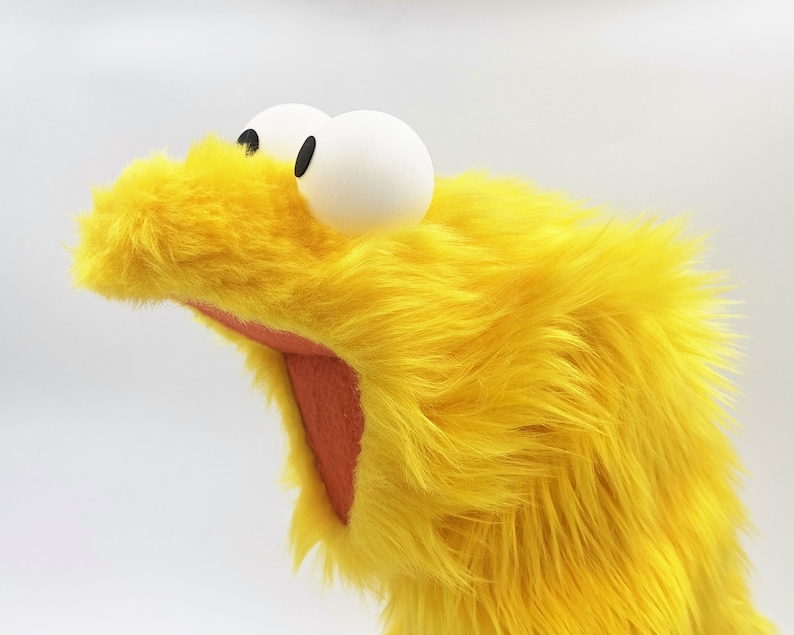 Muppet Running Yellow Little Gustav, a Yellow Muppet Muppet Who Loves to Sleep Long, Dance ...