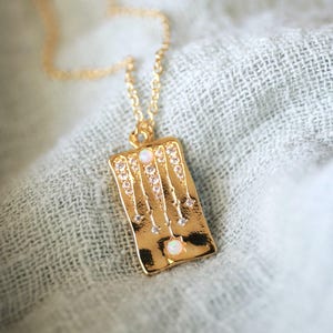 Rechthoekige ketting vallende ster opaal, gouden hemelse sieraden