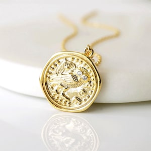 Gouden uilhangerketting: zirkonia's stenen ogen, verguld messing