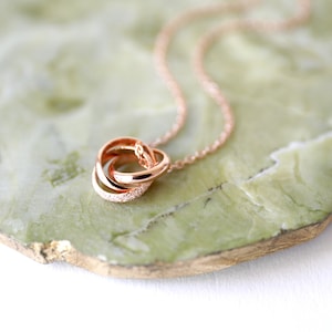 Rose Gold Triple Ring Necklace: Linked Circle Pendant