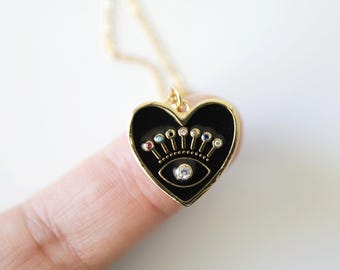 Collana con occhio malvagio in smalto nero: catena in oro, ciondolo in zirconia cubica
