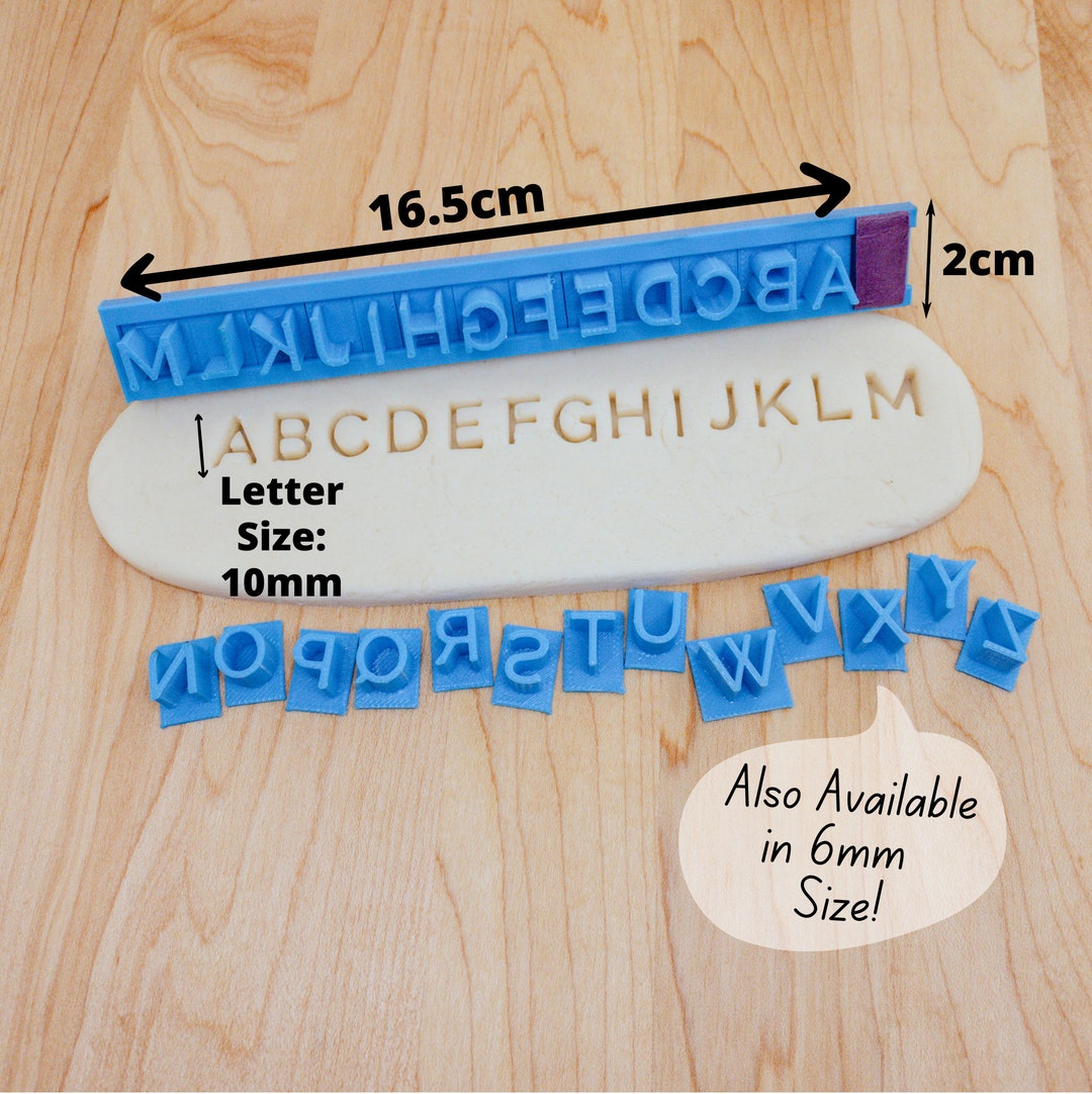 Alphabet / Lowercase tramline Sans Serif Font Letter Stamp