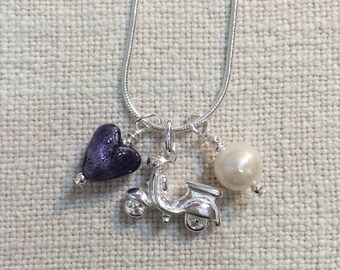 Diana Ingram three charm necklace in Sterling Silver with cornflower blue Murano glass heart white pearl and snake chain dolphin
