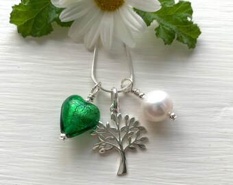 Diana Ingram three charm necklace in Sterling Silver with cornflower blue Murano glass heart white pearl and snake chain dolphin