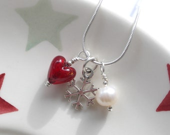 Diana Ingram three charm necklace in Sterling Silver with cornflower blue Murano glass heart white pearl and snake chain dolphin