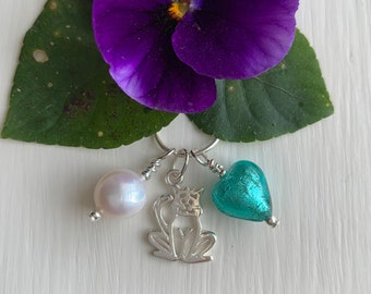 Diana Ingram three charm necklace in Sterling Silver with cornflower blue Murano glass heart white pearl and snake chain dolphin