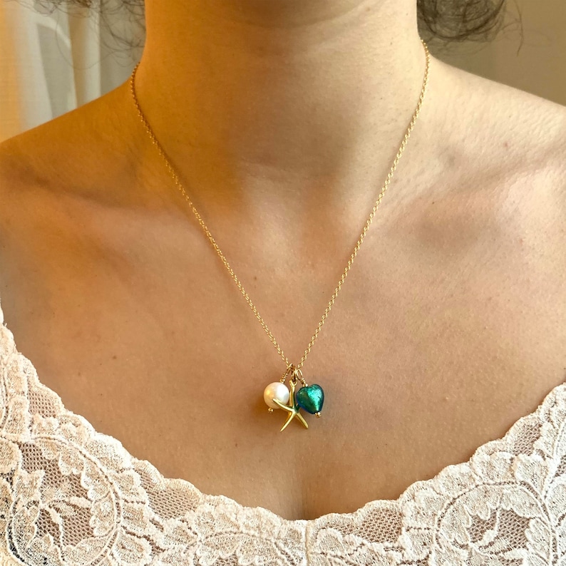 white pearl and chain jade, teal Murano glass heart Diana Ingram three charm necklace in 22 Carat gold vermeil with sea green starfish