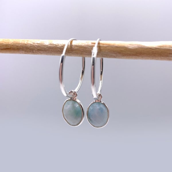 Diana Ingram earrings with larimar (aqua, blue, turquoise) oval crystal gemstones on Sterling Silver small hoop hinged sleeper ear wires