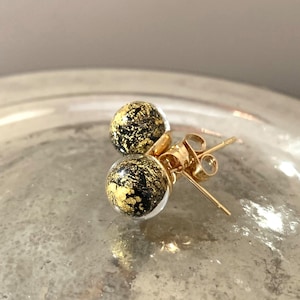 Diana Ingram earrings with black pastel and gold Murano glass sphere (round) studs on 24ct gold plated surgical steel posts