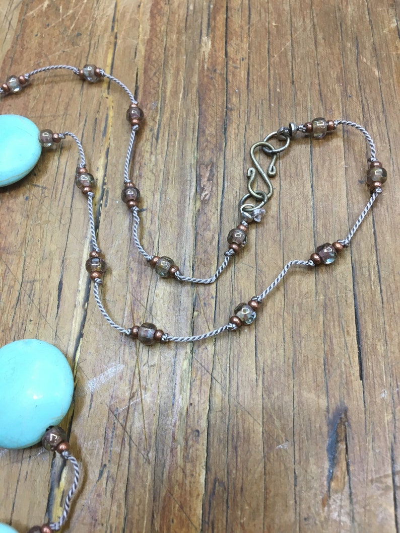 Hand-knotted floating turquoise coin stone necklace
