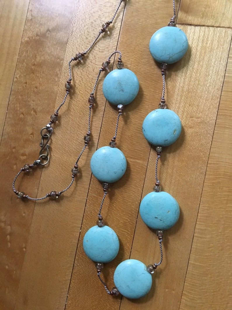 Hand-knotted floating turquoise coin stone necklace