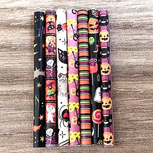 May include: Seven colorful Halloween themed paper straws with various spooky designs, including ghosts, pumpkins, bats, spiders, and candy corn.