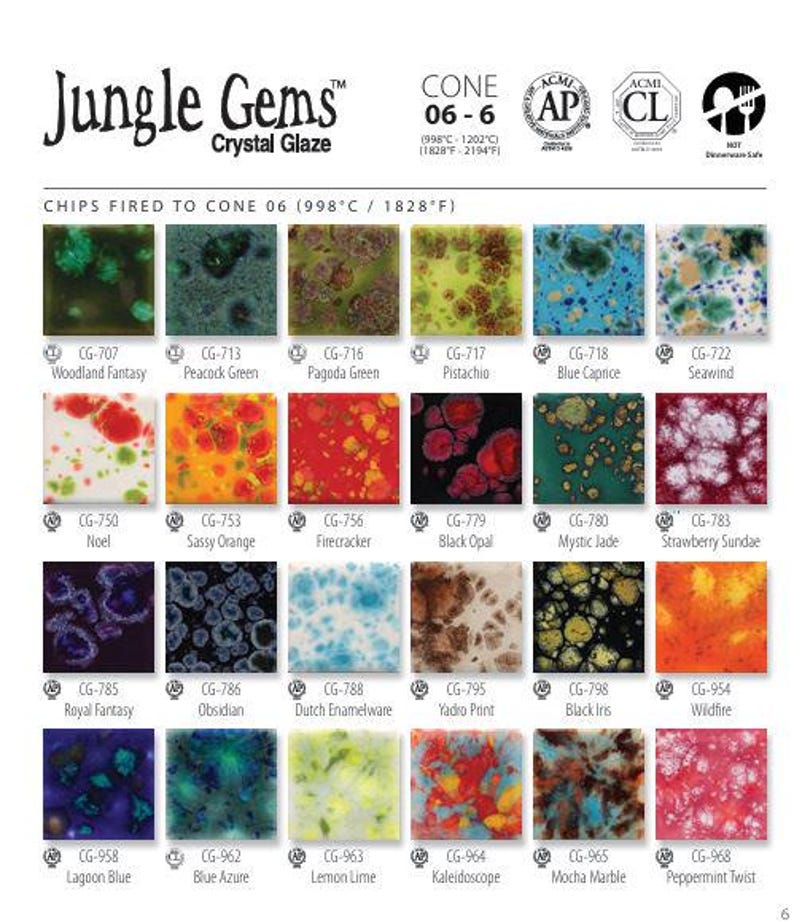 May include: A color chart of Jungle Gems Crystal Glaze ceramic glazes. The chart displays 24 unique glaze colors, each in a square tile. Colors range from green and blue to red and orange, with names like "Woodland Fantasy" and "Black Opal."