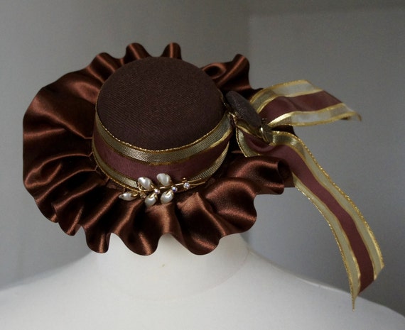 Brown Mini Hat With Brown Satin Ruffle Edge and Gold Stripe  display picture 2