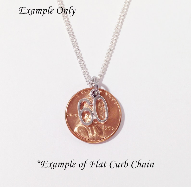 May include: A silver-colored necklace with a penny pendant. The penny has a silver charm with the number 60 attached. The necklace chain is silver and the background is white. The text "Example Only" and "*Example of Flat Curb Chain" are visible.