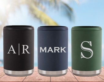 May include: Three insulated beverage holders with personalized names. The holder on the left is black with the letters "AR" in white. The middle holder is blue with the name "MARK" in white. The holder on the right is green with the letter "S" in white.
