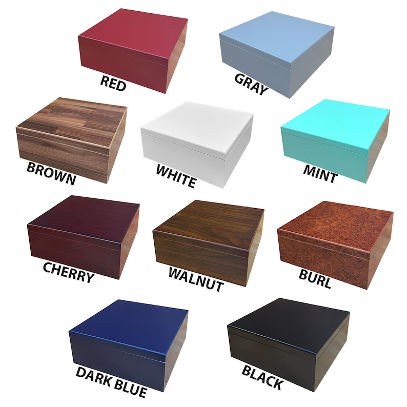 May include: Nine wooden boxes in a variety of colours, including red, grey, brown, white, mint, cherry, walnut, burl, dark blue, and black. The boxes are all the same size and shape, and they are arranged in a grid pattern.