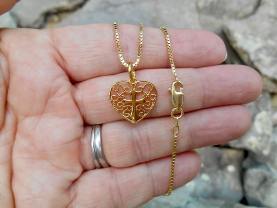 Heart and cross pendant deals