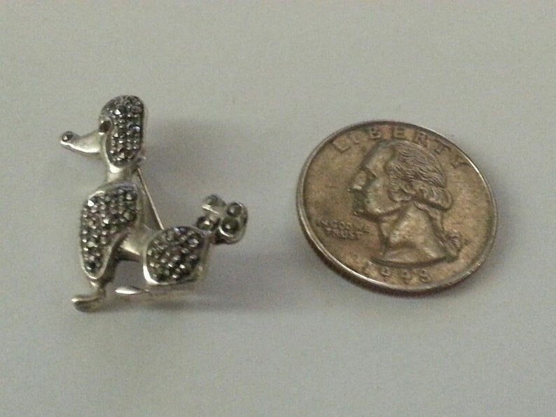 marked 925 Vintage Sterling and Marcasite Seated Poodle Brooch