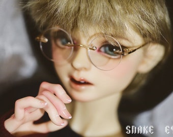 cute doll with specs