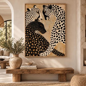 May include: A rectangular wall art print featuring three leopards in a vertical composition. Two leopards are light-coloured with black spots, while one central leopard is black with subtle dark spots. The background is a warm, muted beige tone.